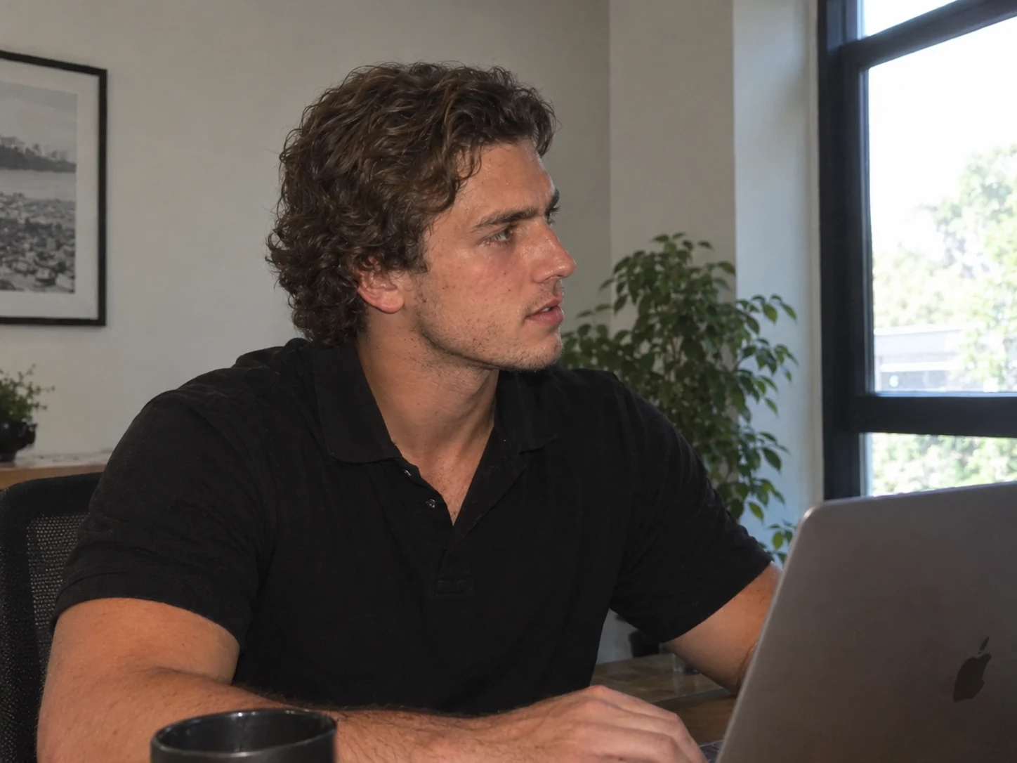 Founder working at a laptop